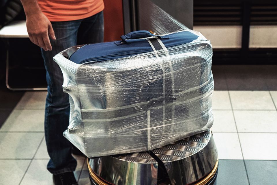 plastic wrap suitcase